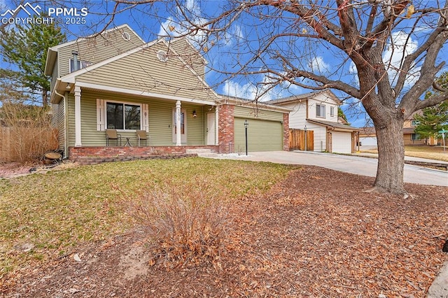 view of front facade with a front yard, brick siding, a garage, and driveway