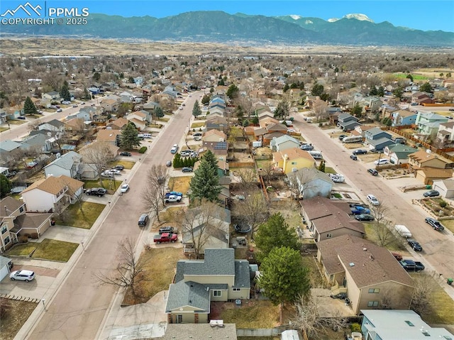 bird's eye view with a mountain view and a residential view