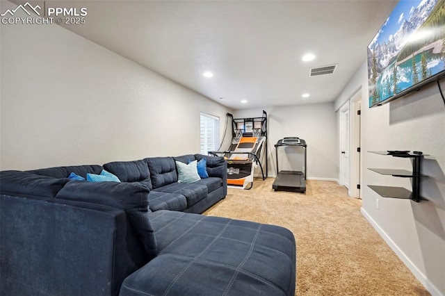 carpeted living area featuring recessed lighting, visible vents, and baseboards