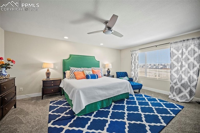 carpeted bedroom featuring a textured ceiling, baseboards, and a ceiling fan