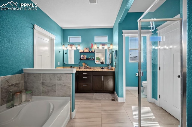 bathroom with visible vents, toilet, a shower stall, a bath, and vanity