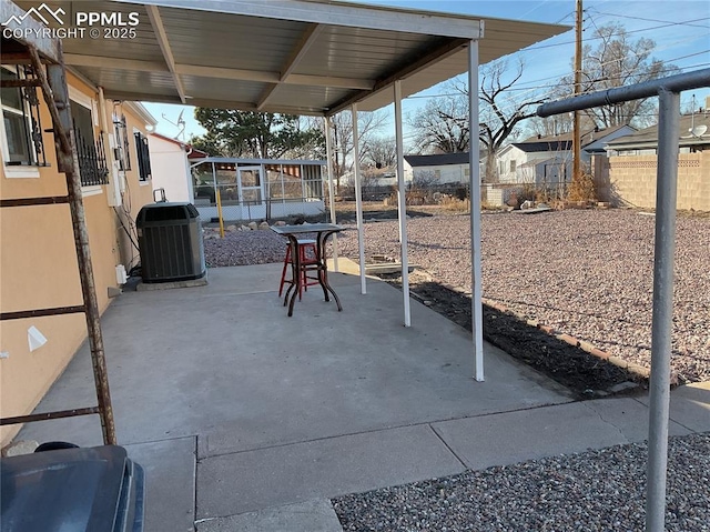 view of patio featuring central AC and a fenced backyard