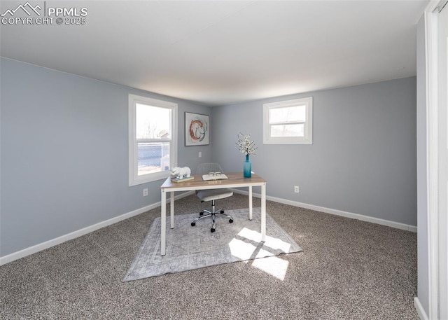 carpeted home office featuring baseboards