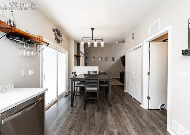 4679 Canyon Wren Ln, Colorado Springs, CO 80916 - dining room featuring dark wood-style floors