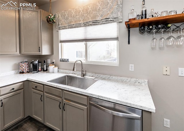 4679 Canyon Wren Ln, Colorado Springs, CO 80916 - kitchen with stainless steel dishwasher, a sink, and gray cabinets