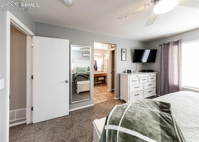 4679 Canyon Wren Ln, Colorado Springs, CO 80916 - bedroom featuring carpet floors, a ceiling fan, ensuite bath, and baseboards