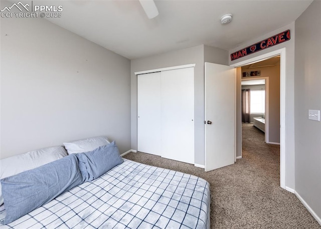 4679 Canyon Wren Ln, Colorado Springs, CO 80916 - bedroom featuring light colored carpet, a closet, baseboards, and a ceiling fan