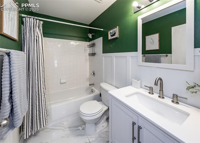4679 Canyon Wren Ln, Colorado Springs, CO 80916 - full bathroom featuring toilet, marble look tiles, shower / bathtub combination with curtain, a wainscoted wall, and vanity