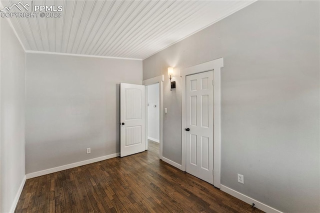 109 Hayes Dr, Colorado Springs, CO 80911 - unfurnished room with dark wood-type flooring, ornamental molding, and baseboards
