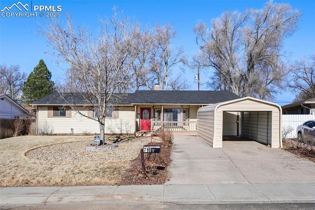 single story home featuring covered porch and fence