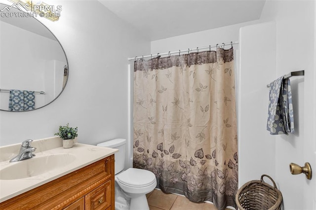 full bath featuring curtained shower, vanity, toilet, and tile patterned floors