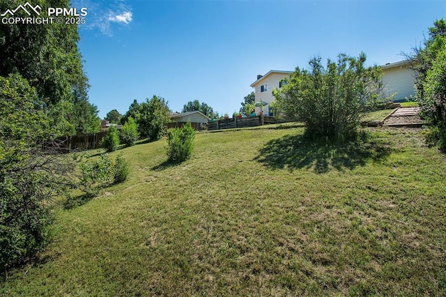 view of yard featuring fence