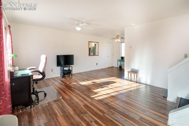 office featuring ceiling fan, baseboards, and wood finished floors