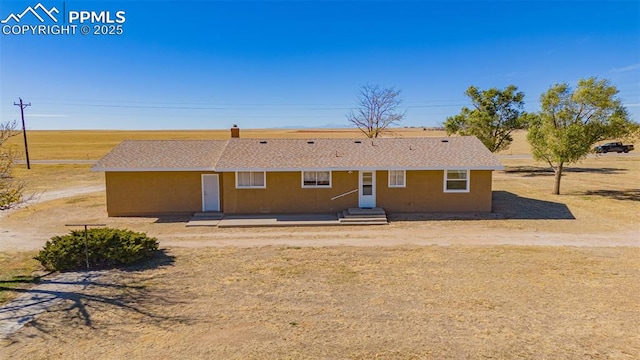 view of front of property featuring stucco siding