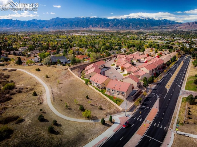 bird's eye view featuring a residential view and a mountain view