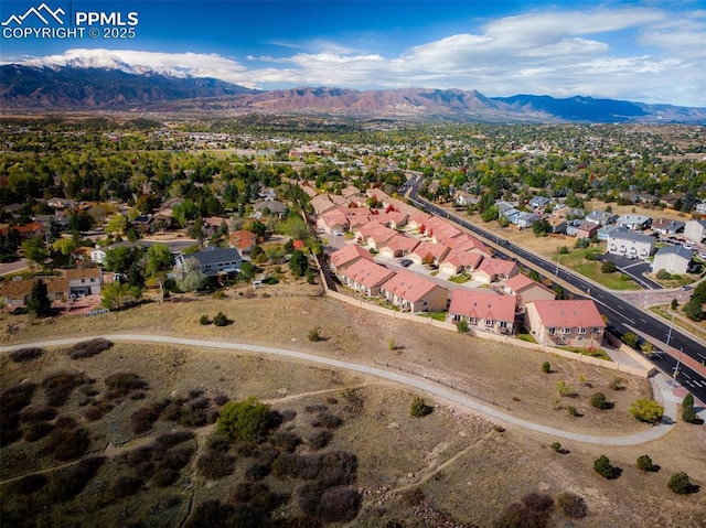 aerial view featuring a residential view and a mountain view