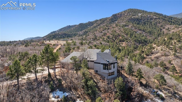 exterior space featuring a mountain view