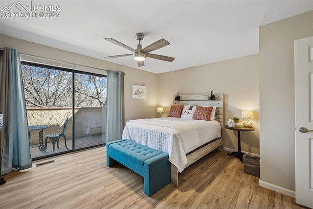 bedroom with wood finished floors, a ceiling fan, visible vents, baseboards, and access to outside