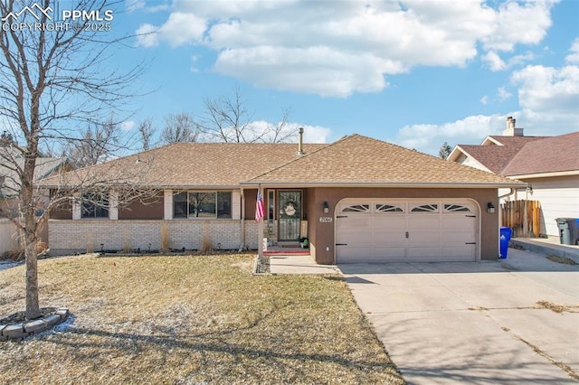 single story home featuring a garage, driveway, a shingled roof, fence, and brick siding