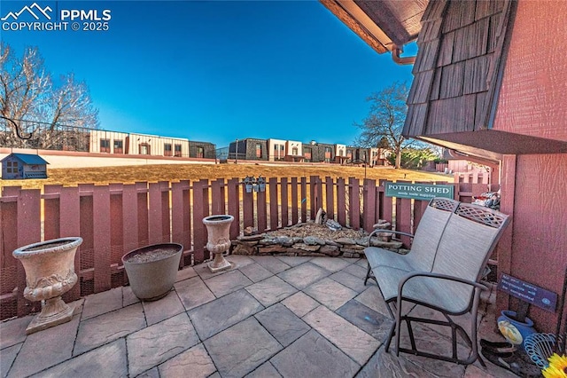 view of patio / terrace with fence