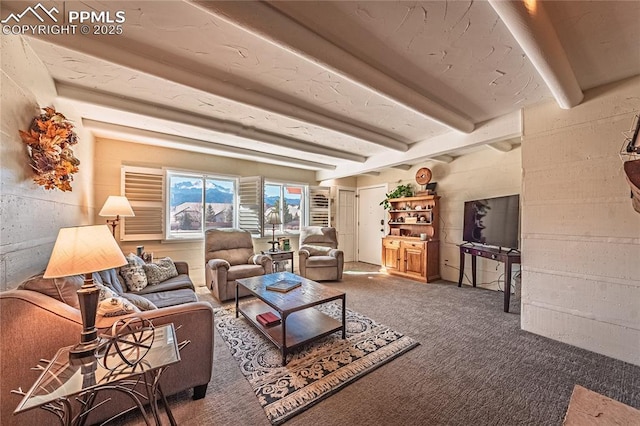 living area featuring carpet flooring and beam ceiling