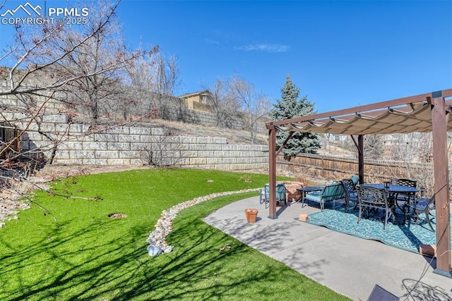 view of yard featuring a fenced backyard, a patio, and a pergola