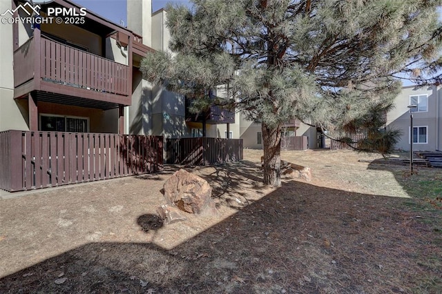 9995 E Harvard Ave Unit 155, Denver, CO 80231 - view of yard with fence