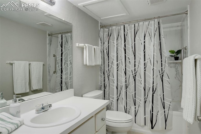 9995 E Harvard Ave Unit 155, Denver, CO 80231 - bathroom with shower / bath combo, visible vents, vanity, and toilet