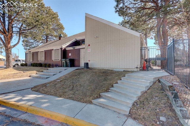 9995 E Harvard Ave Unit 155, Denver, CO 80231 - view of front of house featuring fence