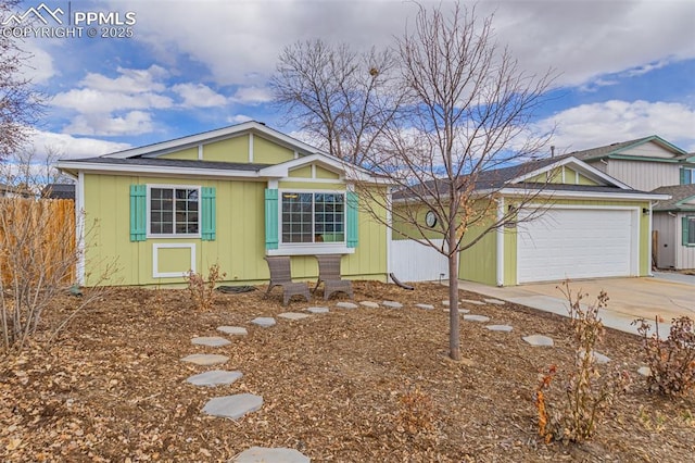 view of front of home featuring driveway and an attached garage