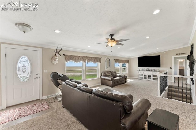 carpeted living room featuring crown molding, lofted ceiling, visible vents, a textured ceiling, and baseboards