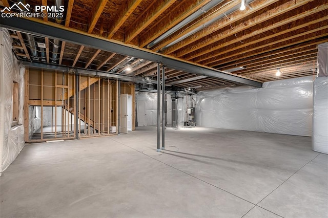 unfinished basement with water heater