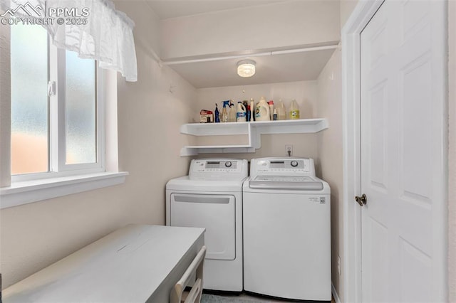 washroom with laundry area and separate washer and dryer