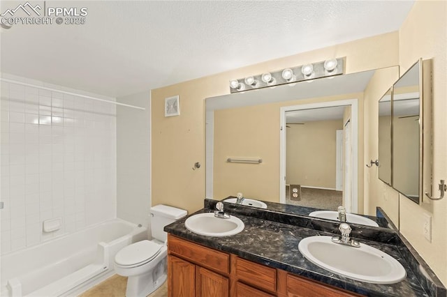 bathroom featuring toilet, a sink, and visible vents