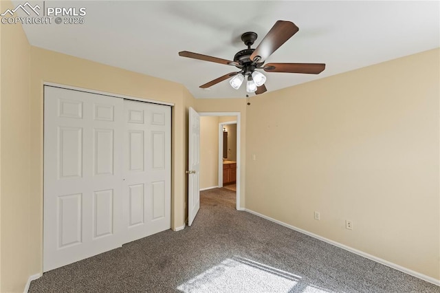 unfurnished bedroom with carpet floors, a closet, ceiling fan, and baseboards