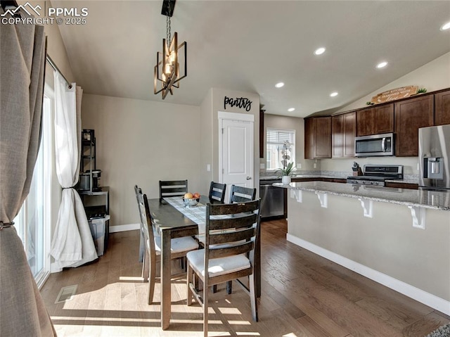 dining area with visible vents, baseboards, lofted ceiling, dark wood-style floors, and recessed lighting