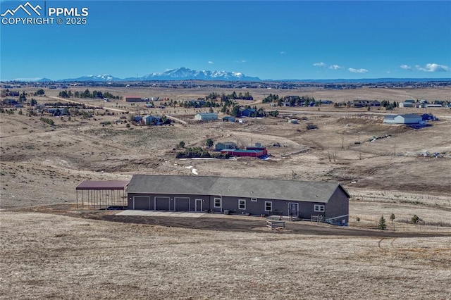 aerial view with a rural view and a mountain view