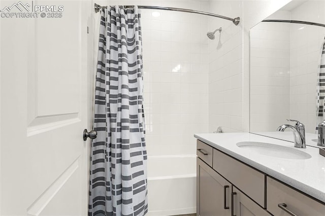 full bathroom featuring vanity and shower / tub combo with curtain