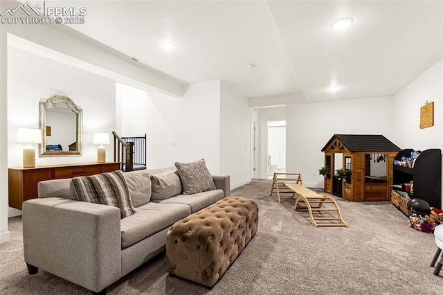 living area with carpet flooring, recessed lighting, and baseboards