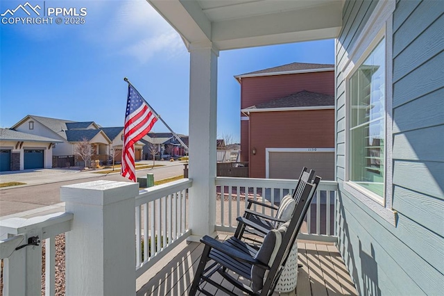 balcony featuring a residential view