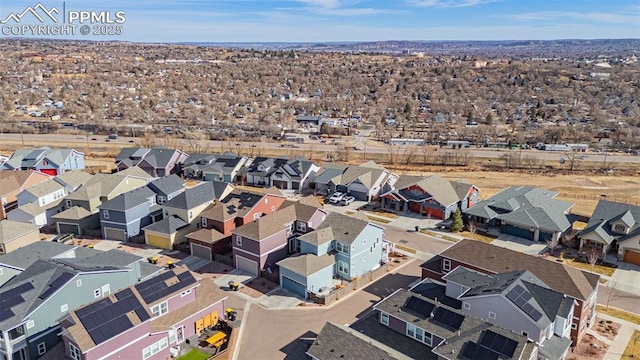 drone / aerial view with a residential view