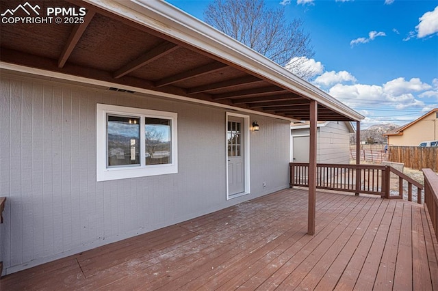 wooden terrace with fence