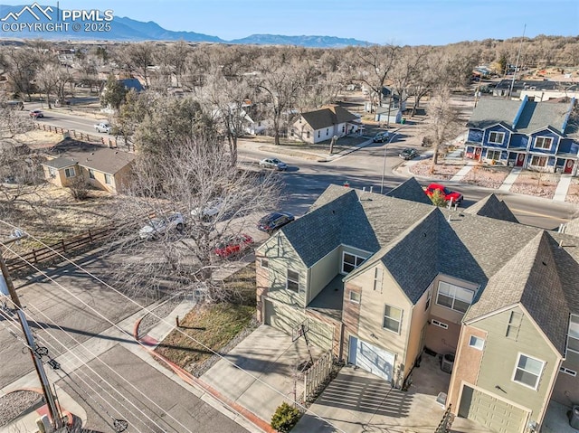 aerial view featuring a mountain view and a residential view