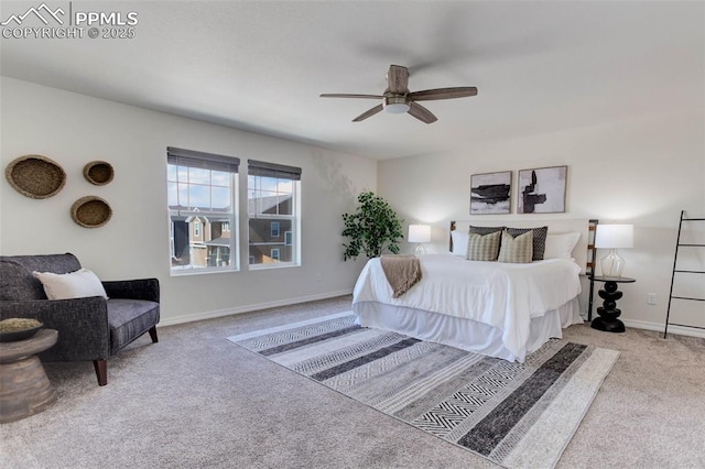 bedroom featuring carpet floors, baseboards, and a ceiling fan