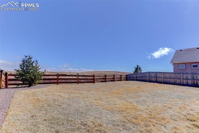 view of yard with fence