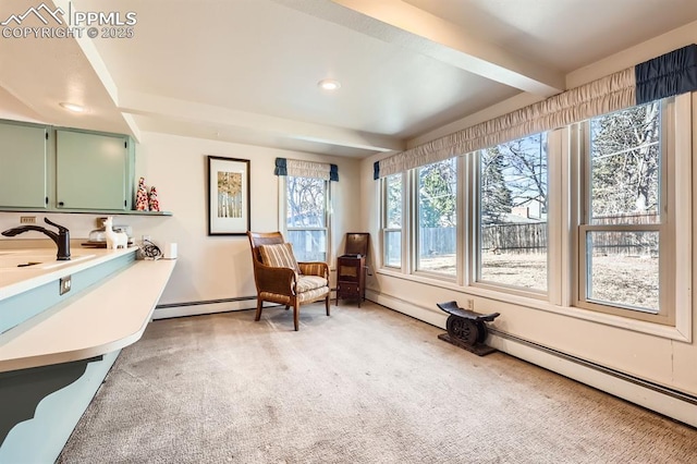 living area with recessed lighting, beamed ceiling, and light colored carpet