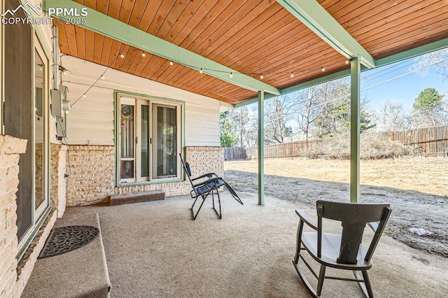 view of patio with fence