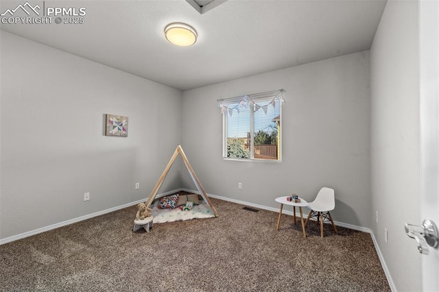 game room with carpet floors, visible vents, and baseboards