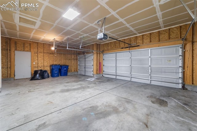 garage featuring a garage door opener