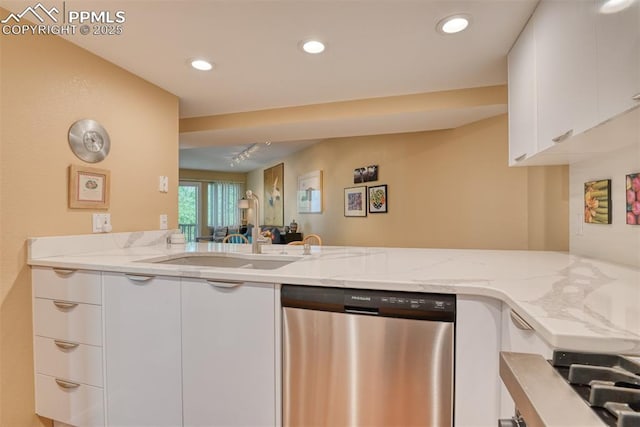 kitchen with white cabinetry, light stone counters, stainless steel dishwasher, and recessed lighting